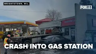 Flatbed truck crashes into gas station, sends driver to the hospital