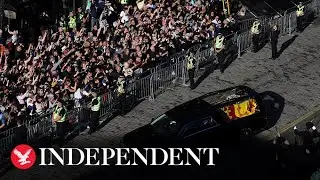 Princess Anne follows Queen's coffin as crowds applaud on journey to London