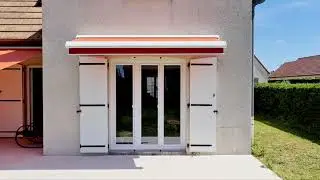 store banne Coublanc avec lambrequin d&eacute;roulable