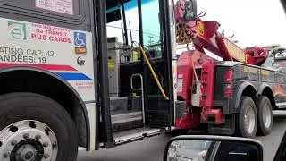 Coach UsA Bus Being Towed