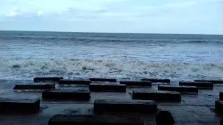 Spilling breaker with foaming zone in sankarpur beach