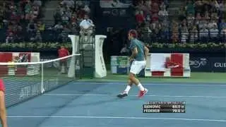 Roger Federer Hits Hot Shot In Dubai Against Djokovic