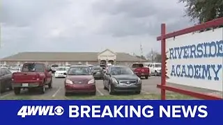 Police arrest janitor at St. John Parish school for locker room cameras