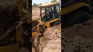 See how a well is dug with a JCB.