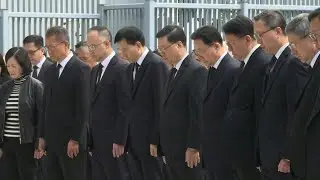 Hong Kong govt observes moment of silence for fire victims | AFP