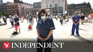 NHS workers hold two-minutes silence at Leeds protest