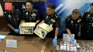 Alert cops foil armed robbery bid, seize guns and RM300,000 stash