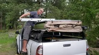 Smittybilt Overlander Rooftop Tent setup on Toyota Tacoma