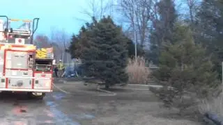 Watch investigators at scene of deadly Lapeer County house fire