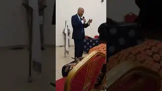 Dr Ewan Denny speaking at the international conference in Nigeria 2024