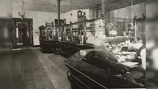 The Teller Station, Fireplace Mantel, and Vault Doors Inside the Bank Building