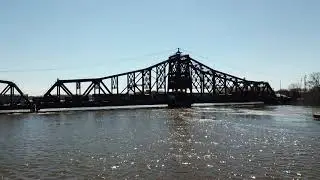 Flying under the south bridge up to the train bridge during high water