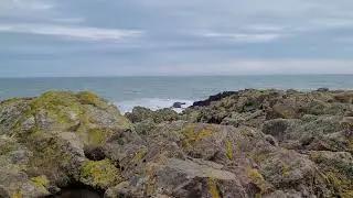 Scotland - Boddam: the north sea viewed from the cliffs at the bottom of the lighthouse