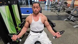 seated bicep curl machine isolates and targets your biceps using adjustable weights.