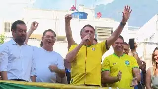 Former Brazilian President Jair Bolsonaro rallies with political ally investigated for spying on pol