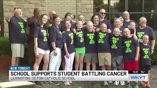 School supports student battling cancer with head shaving event.