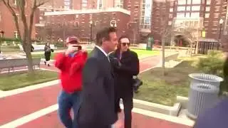 Protester throws Russian flag at Manafort-President Trump's former campaign manager
