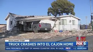 Pickup truck crashes into El Cajon home, collapses garage