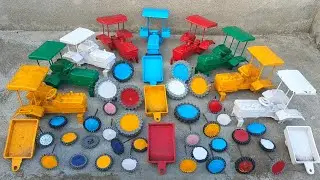 Yellow colour mini tractor trolley tyres fitting and moving tractor video 