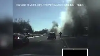 Burning Truck Rolls Toward Police Cars And Traffic