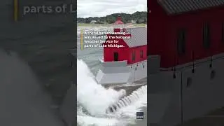 Massive waves pound Lake Michigan lighthouse in dramatic drone footage