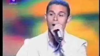 عمار حسن - على بابي واقف قمرين - سوبر ستار 2004.wmv
