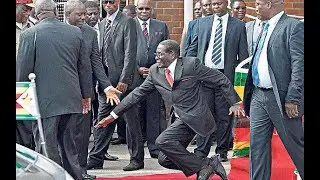 President  Robert Mugabe  Falling Down!