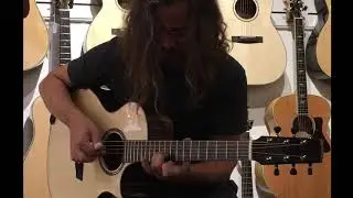 Dave Martin at The Twelfth Fret demonstrating a new G W Barry Mod C CW in Malaysian Blackwood.