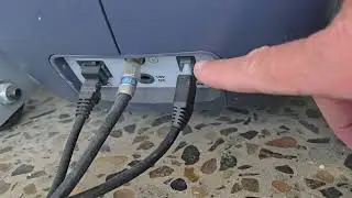 Precor AMT power cord connector fallen into front main cover, how to reconnect.