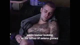 justin bieber looking at selena gomez tattoo while his wife is sitting right besides him.