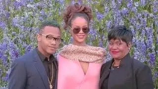 Rihanna, her mother Monica and brother Rajad on their way to the Dior Fashion Show
