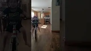 New balance bike trick?? Dancer legs! #indoorbike #balancebike #toddlers #kids