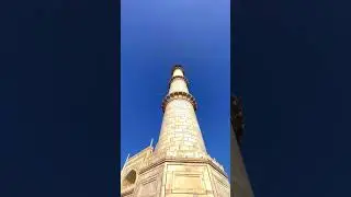 The Taj Mahal, a white marble mausoleum located on the right bank of the Yamuna River in Agra, Uttar