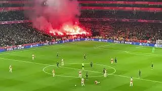 SHOCKING! Lens fans throw a flare directly into the Arsenal fans!