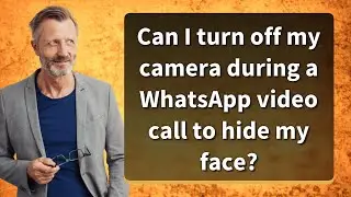 Can I turn off my camera during a WhatsApp video call to hide my face?
