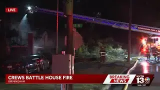 Firefighters battle early morning house fire in North Birmingham