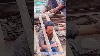 Unexpected Obstacle: A Carpenter's Head Stuck in Roof Framework