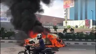 LIVE: Tata Altroz CNG Car Catches Fire in Gurgaon 🚨 Shocking Incident!