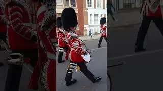 The band of the grenadier guards and the 1st battalion Grenadier guards going to Windsor castle 