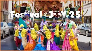 Kids dance in front of Chariot Festival of Joy 2025  at Bloomington-Normal