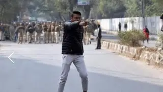 A man brandished a gun near Jamia Millia Islamia University in Delhi, Detained
