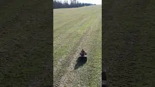 Riding atv through the field drone view #atv #drone #nature #shorts