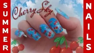Blue sky marble dip powder nails with cherry stickers #dippowdernails #diy #nailinspo #naildesign
