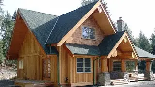 Hybrid Log Cabin Has a Spectacular Rustic Staircase and Stunning Log work Inside
