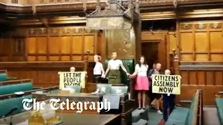 Extinction Rebellion protesters glue themselves around Speaker's chair in Parliament