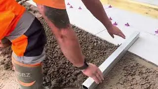 Proslab screed bar in action laying a 20mm porcelain 459x900 #proslab #construction #diy 