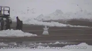 Snowman-building airmen catch Twitter’s attention while fixing F-16 in Japan