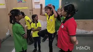 Students of 4th standard are performing drama , The laughing king in the classroom.