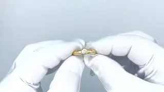 Bague jonc en or jaune 18 Cts avec un diamant taille brillant de 0,20 Cts H-VS.