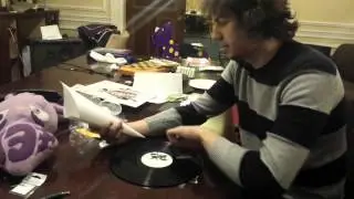 Playing a record with a needle and paper